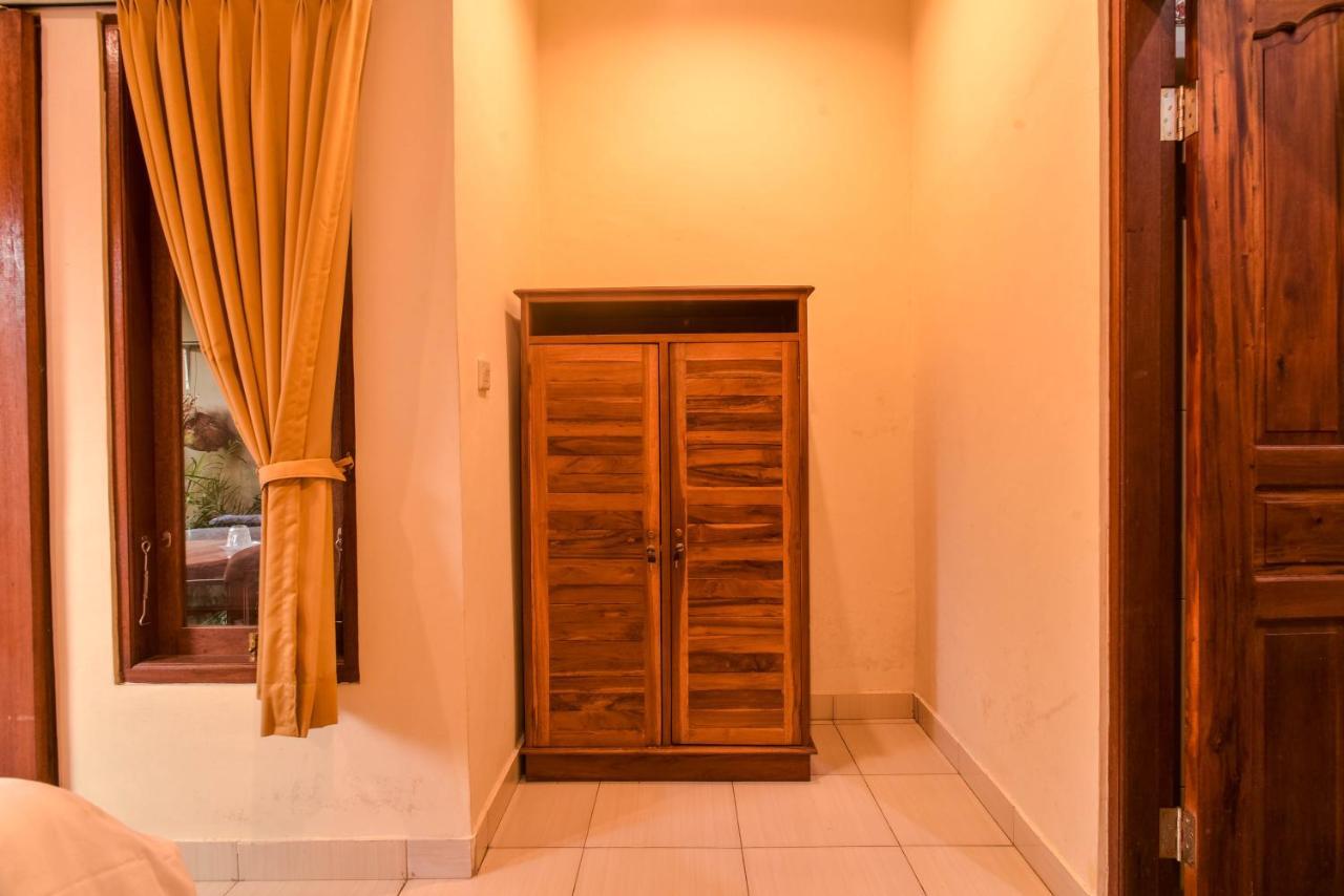 Hotel Kamar Suci House à Ubud Extérieur photo